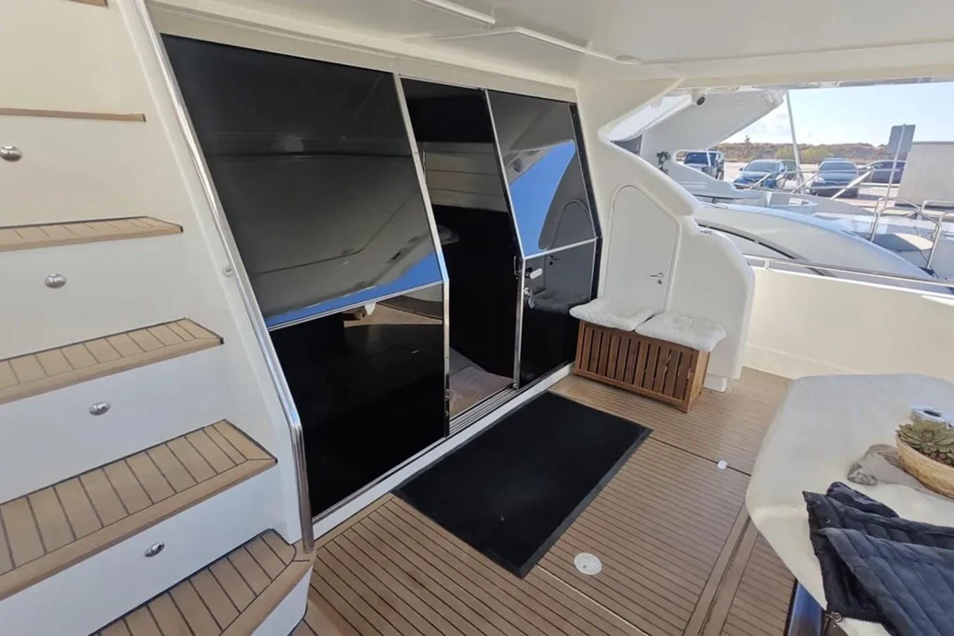 a room with a large black door aboard HINXXLVI02 Yacht for Sale