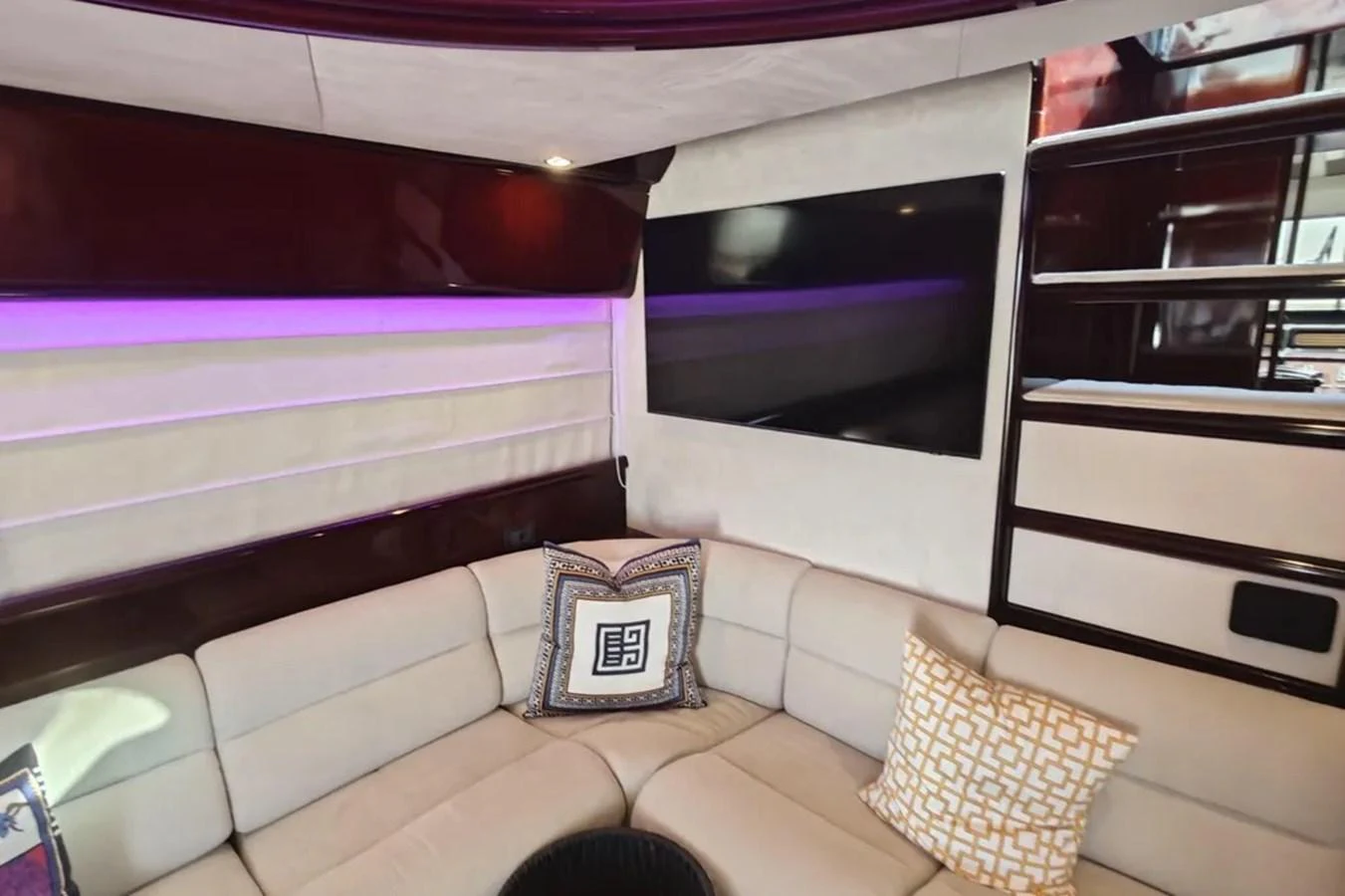 a room with a bed and a television aboard HINXXLVI02 Yacht for Sale