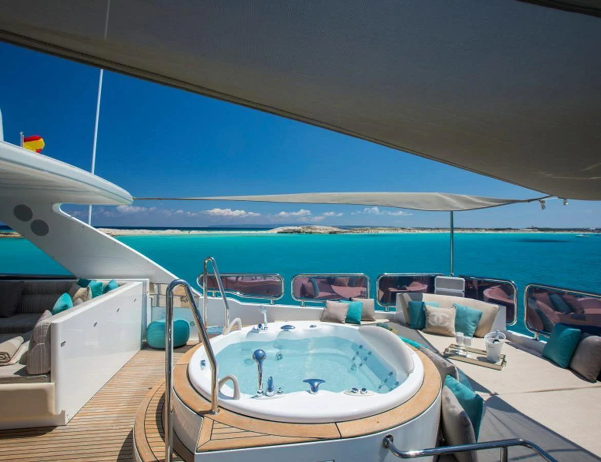 The sundeck features a luxurious jacuzzi with stunning ocean views. aboard MR & MRS SMITH Yacht for Sale