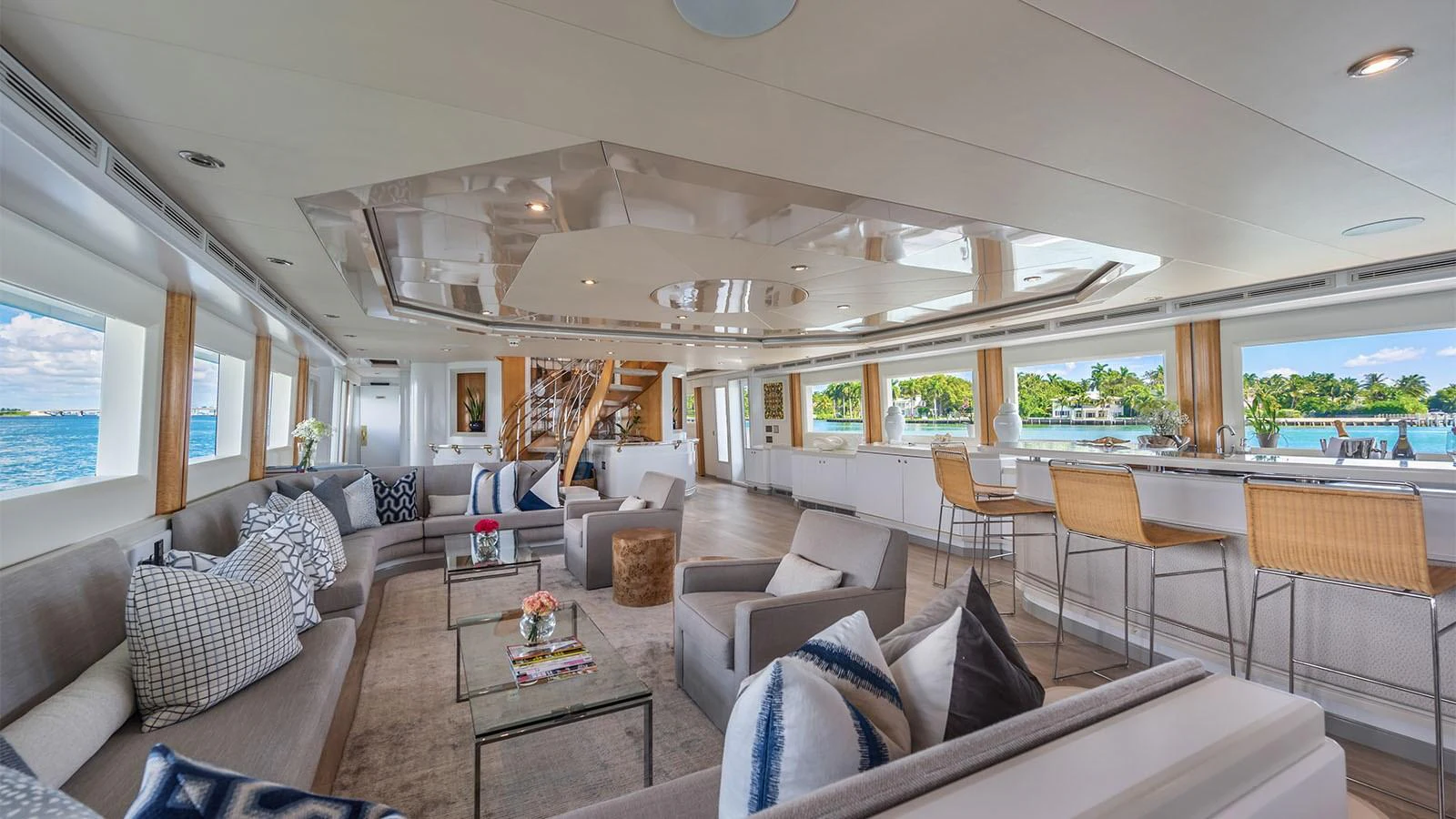 a living room with a couch and a table aboard SURINA Yacht for Sale