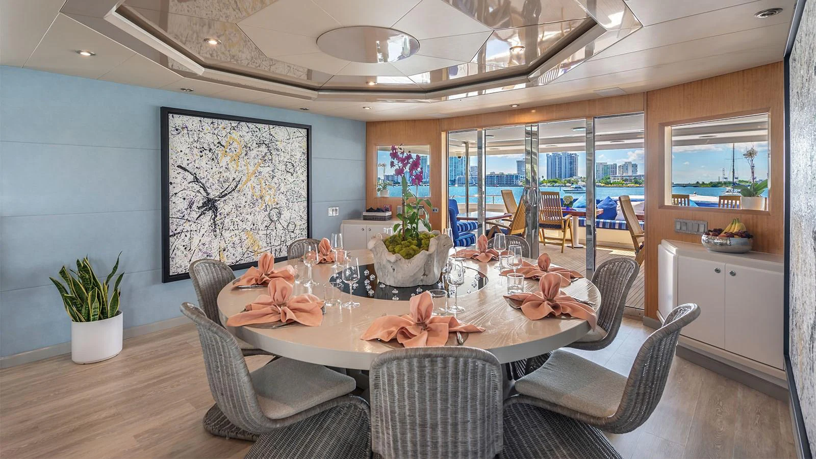 a dining room with a large table aboard SURINA Yacht for Sale