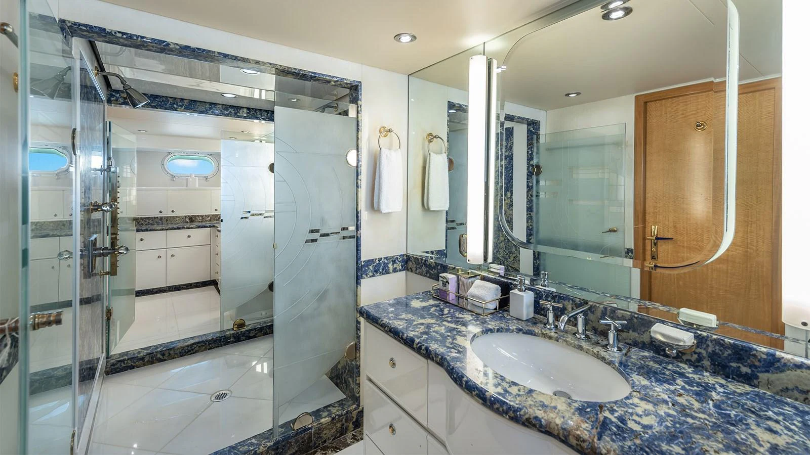 a bathroom with a large countertop aboard SURINA Yacht for Sale