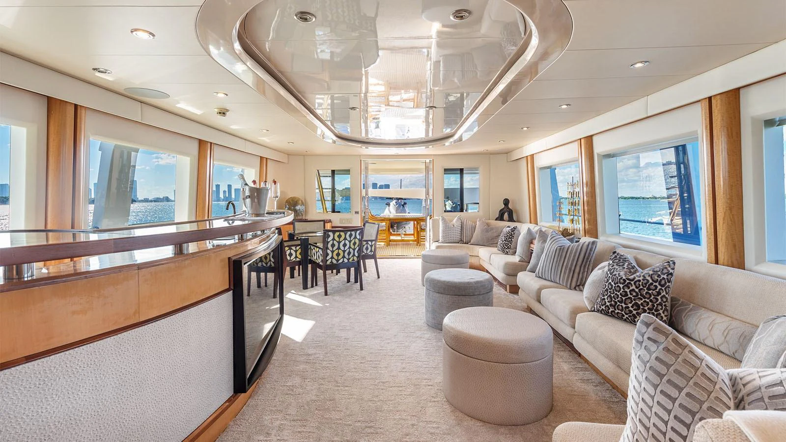 a large living room with a large window aboard SURINA Yacht for Sale