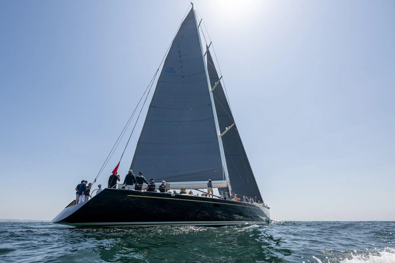a sailboat with people on it aboard GREEN EYES Yacht for Sale
