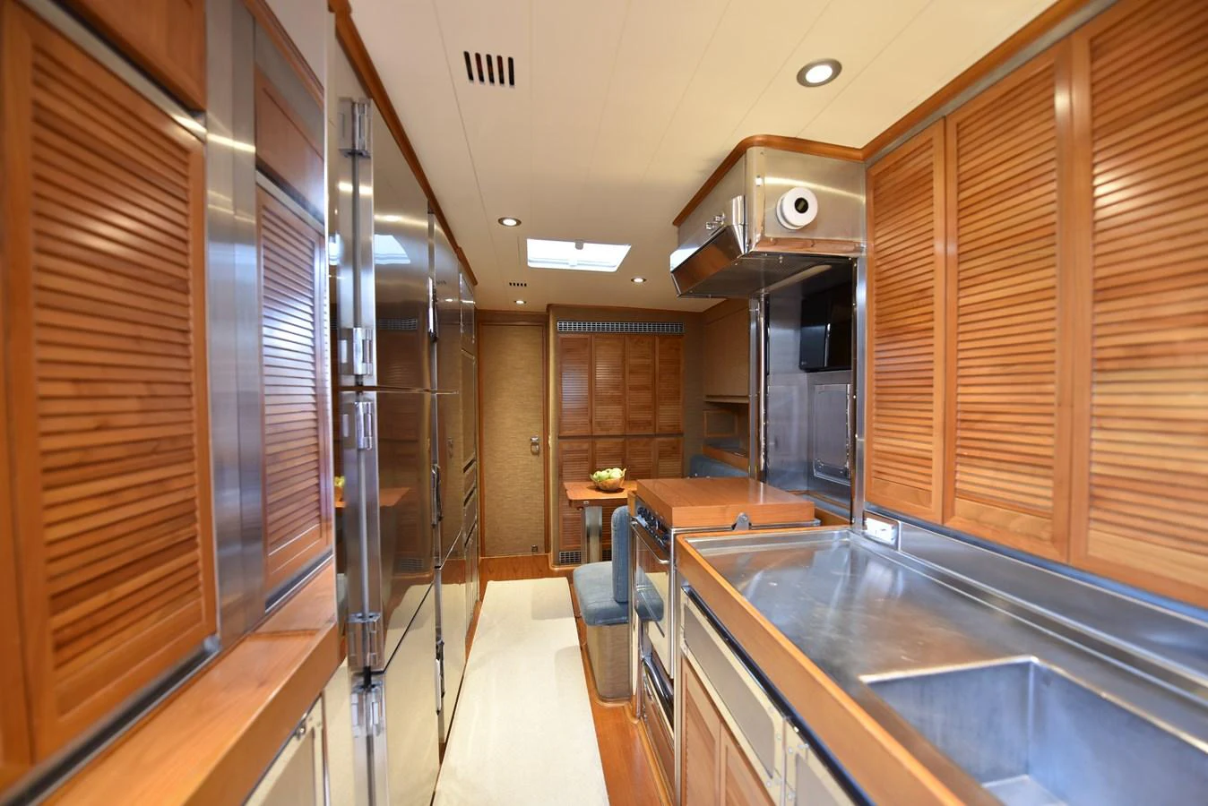 a kitchen with a large counter aboard GREEN EYES Yacht for Sale