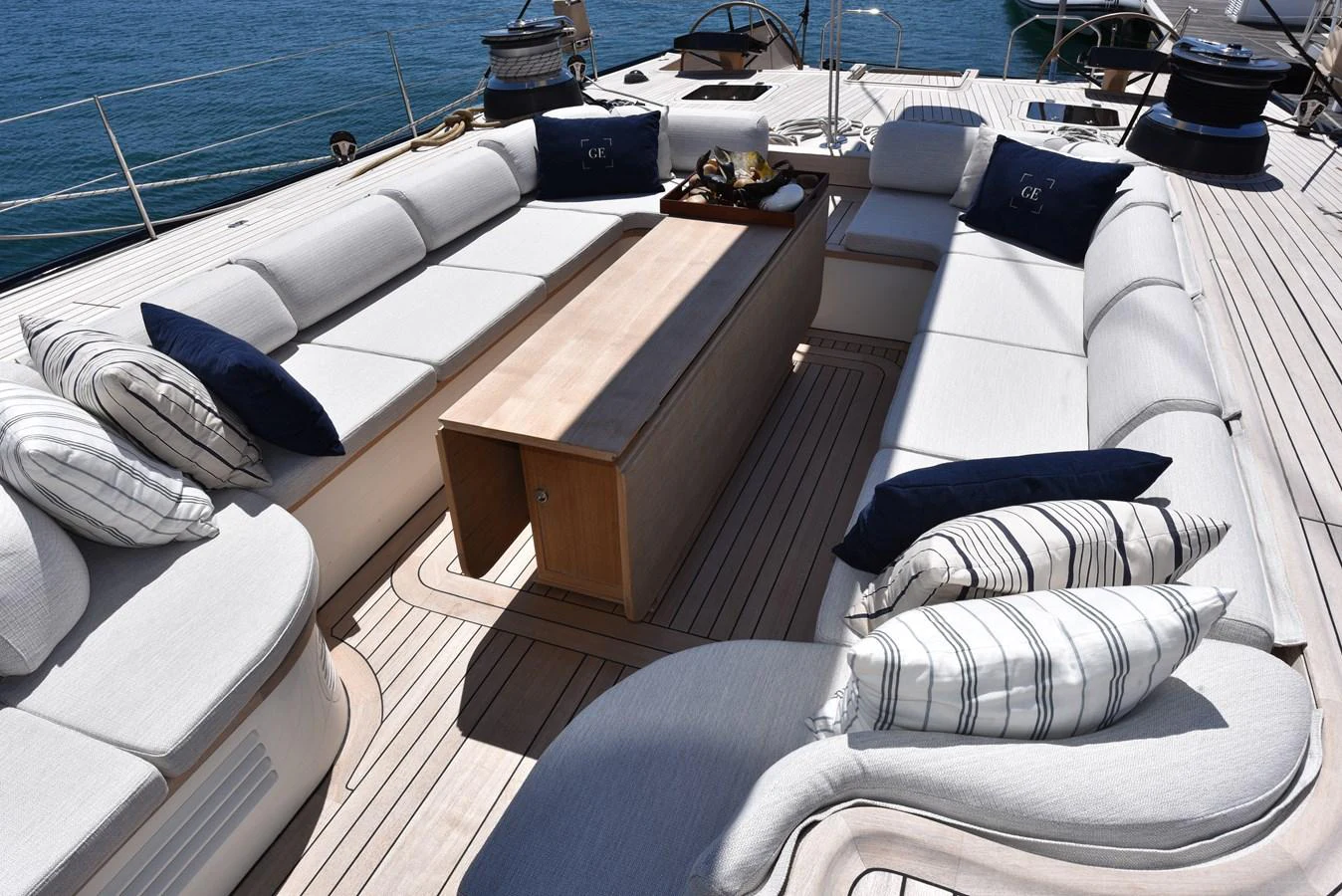 a boat with a table and chairs aboard GREEN EYES Yacht for Sale