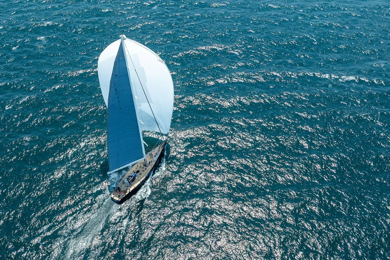 a white and black boat in the water aboard GREEN EYES Yacht for Sale