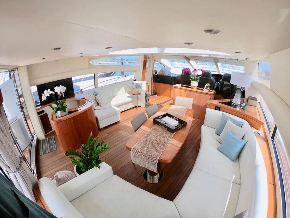 a living room with a large window aboard GBXSK03391E506 Yacht for Sale
