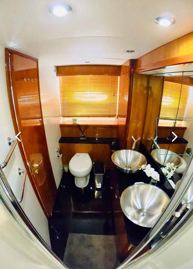 a bathroom with a sink and toilet aboard GBXSK03391E506 Yacht for Sale