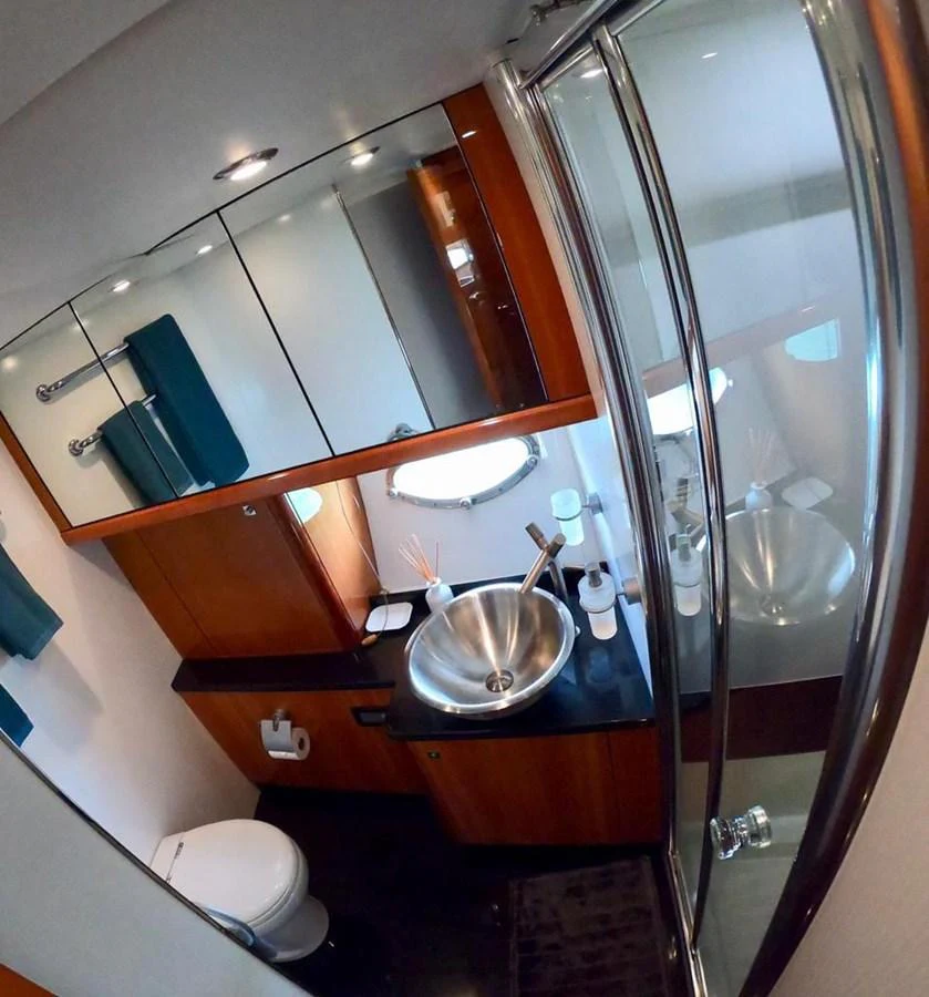 a bathroom with a glass shower aboard GBXSK03391E506 Yacht for Sale