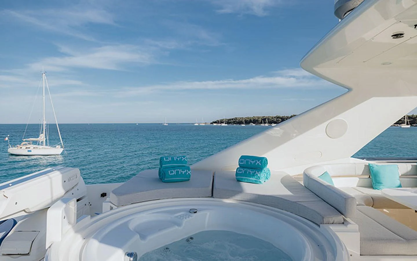 The sundeck features a luxurious jacuzzi with stunning ocean views. aboard ONYX Yacht for Sale