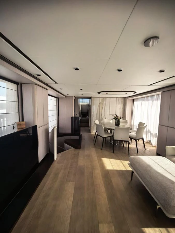 The yacht's salon features a spacious and elegantly designed dining area with modern furnishings and ample natural light. aboard TBN 860 Yacht for Sale