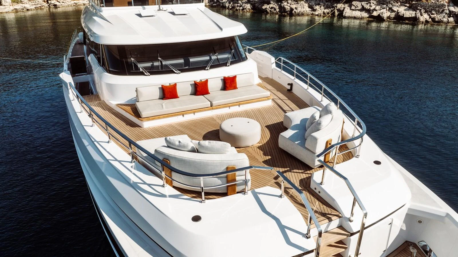 The yacht's foredeck features luxurious seating and a stylish design, perfect for relaxation. aboard AT ONE Yacht for Sale