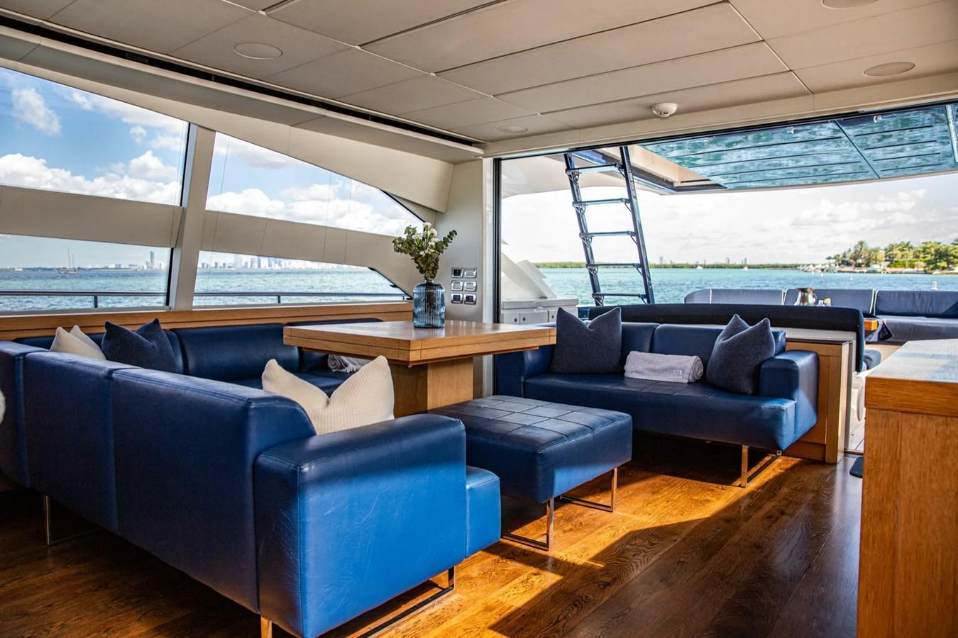 The salon offers a spacious and comfortable seating area with stunning views of the water. aboard DOROTHY ANN Yacht for Sale