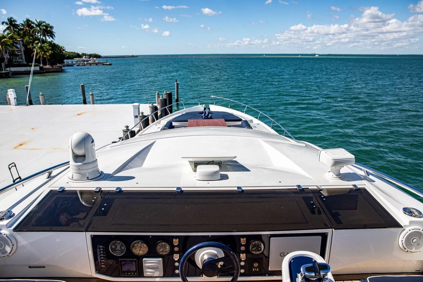 The yacht's helm offers a commanding view of the serene waters and clear skies. aboard DOROTHY ANN Yacht for Sale