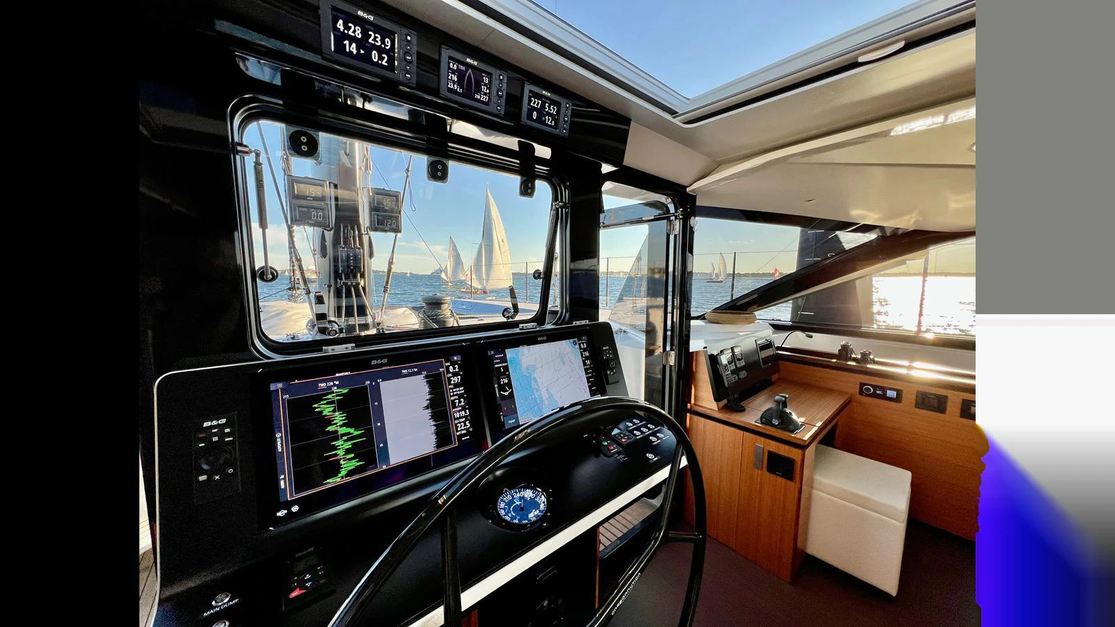 The helm of this yacht features advanced navigation equipment and a panoramic view of the sea. aboard GUNBOAT 80 Yacht for Sale