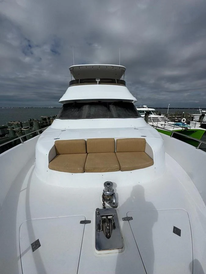 The yacht's bow features a spacious seating area with comfortable cushions, perfect for relaxation. aboard 68' HARGRAVE OPEN BRIDGE Yacht for Sale