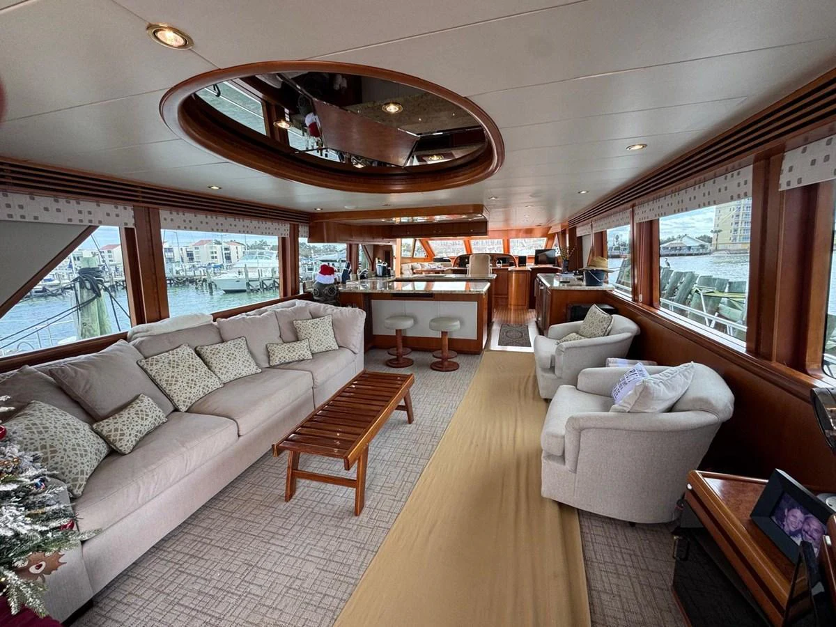 The salon offers a spacious and inviting area with plush seating and panoramic views. aboard 68' HARGRAVE OPEN BRIDGE Yacht for Sale
