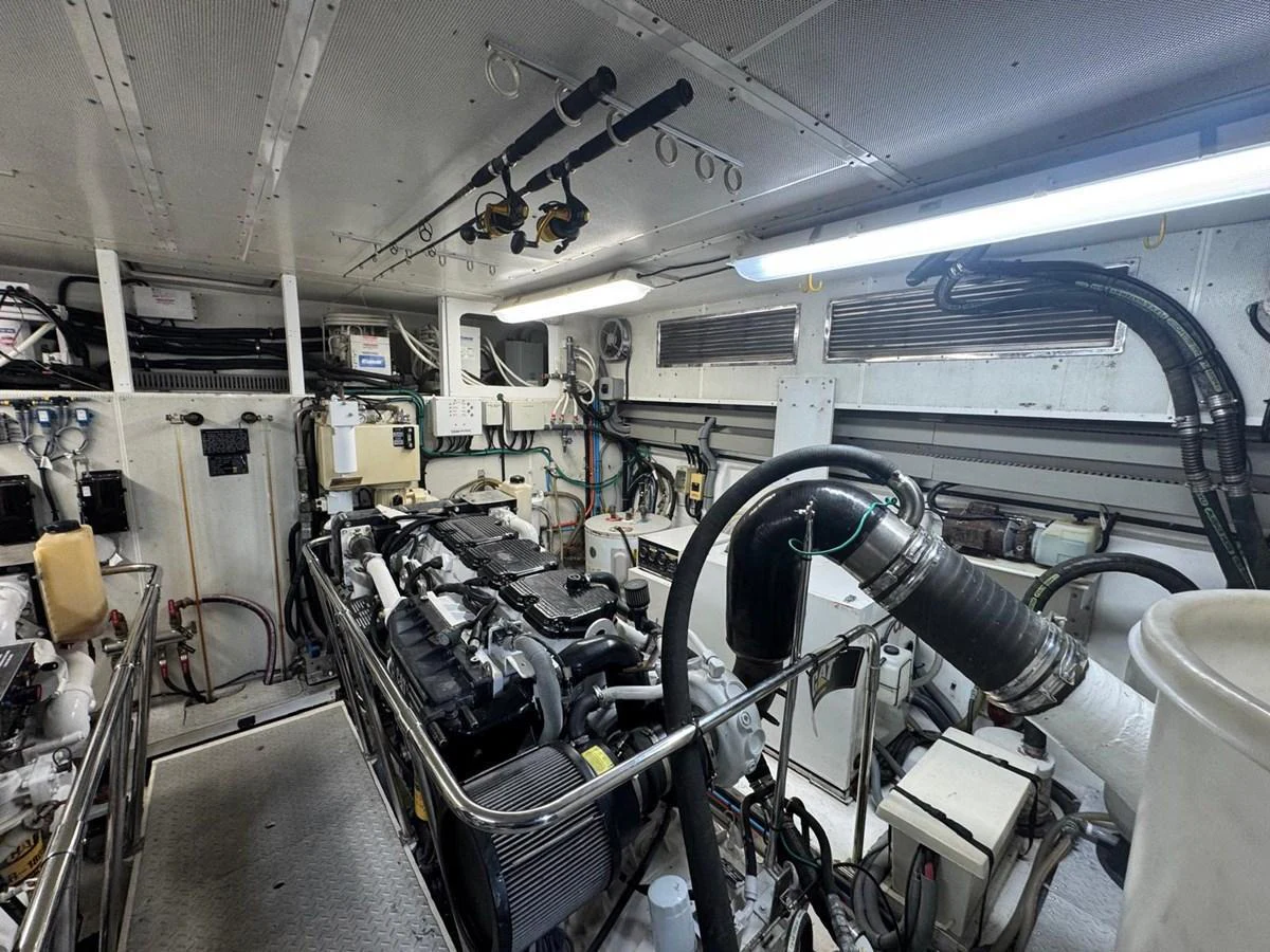 The image showcases the yacht's well-maintained engine room with various mechanical components and systems. aboard 68' HARGRAVE OPEN BRIDGE Yacht for Sale