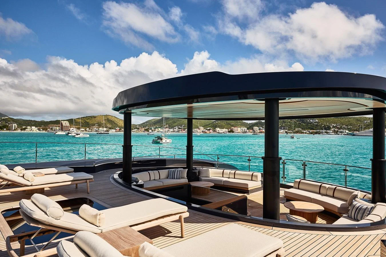 The sundeck offers luxurious lounging with panoramic views of the turquoise waters. aboard SEAWOLF X Yacht for Sale