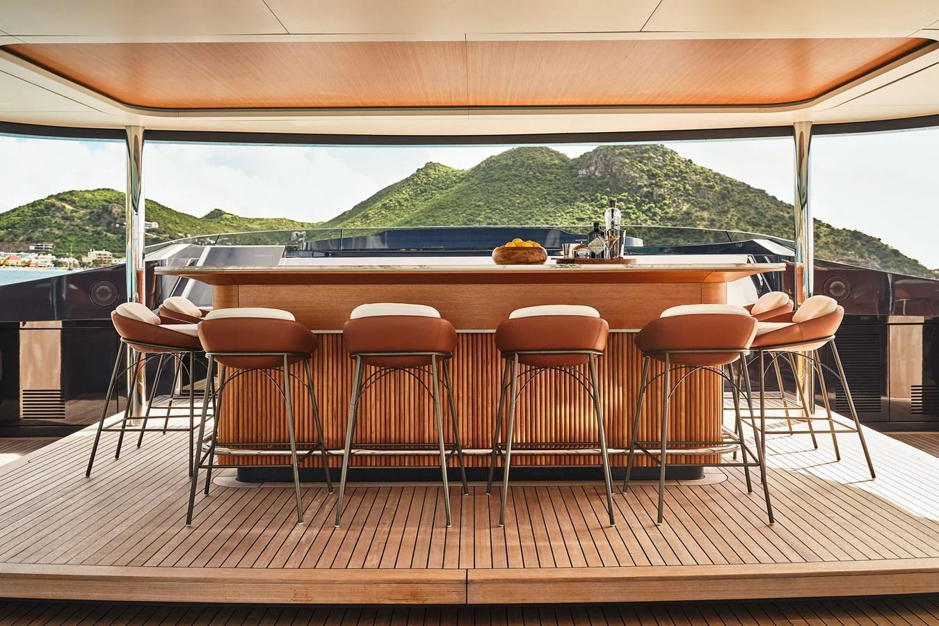 This elegant bar area offers a stunning view of the surrounding landscape, perfect for socializing and relaxation. aboard SEAWOLF X Yacht for Sale