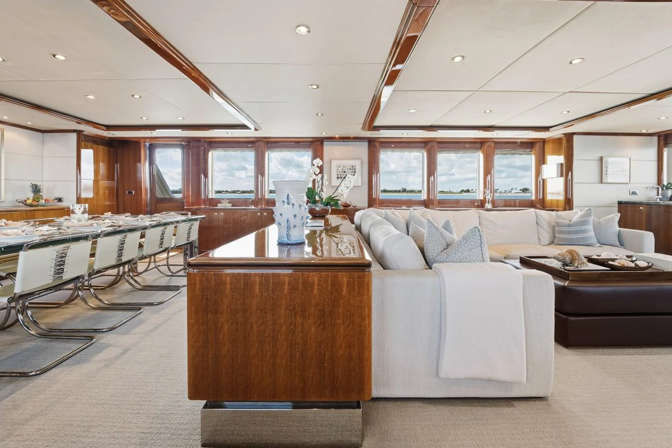 a large living room with a large window aboard STAMPEDE Yacht for Sale