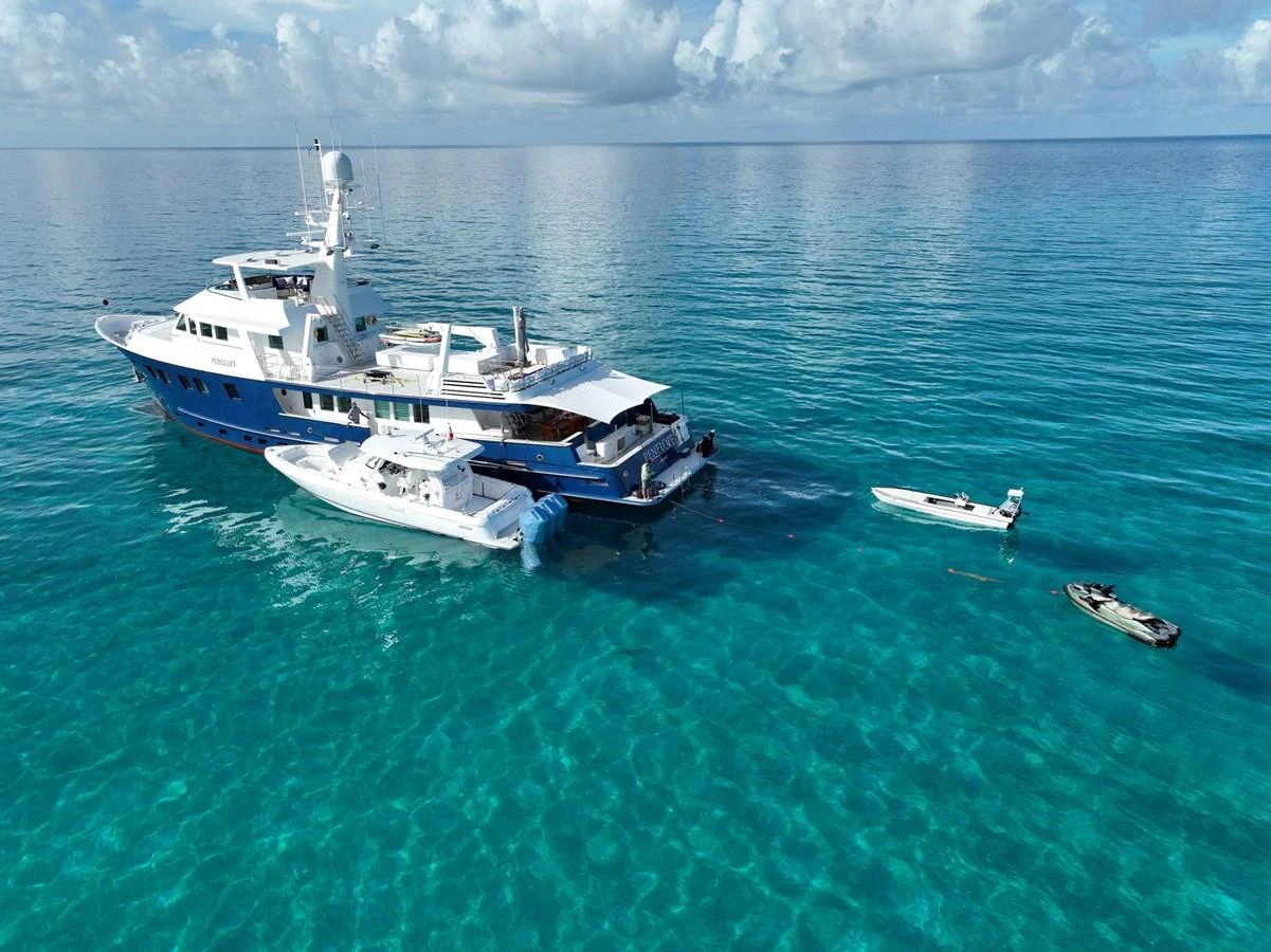 a boat in the water aboard STAMPEDE Yacht for Sale
