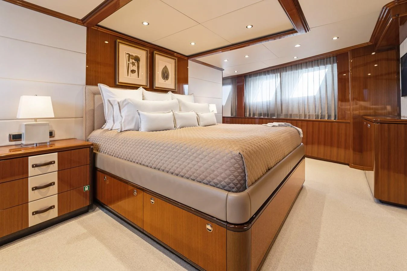 a large bedroom with a bed aboard STAMPEDE Yacht for Sale