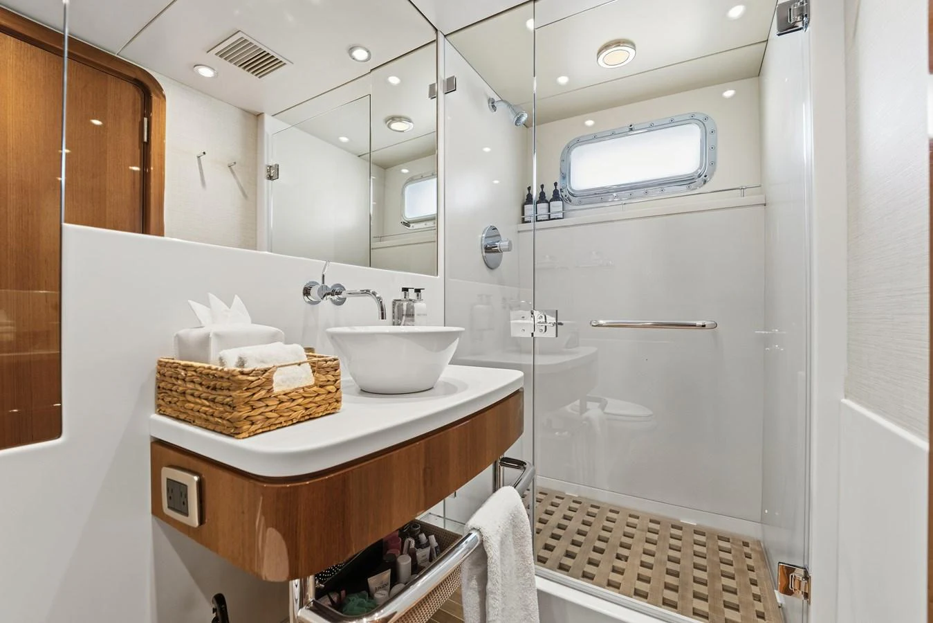 a bathroom with a sink and a mirror aboard STAMPEDE Yacht for Sale