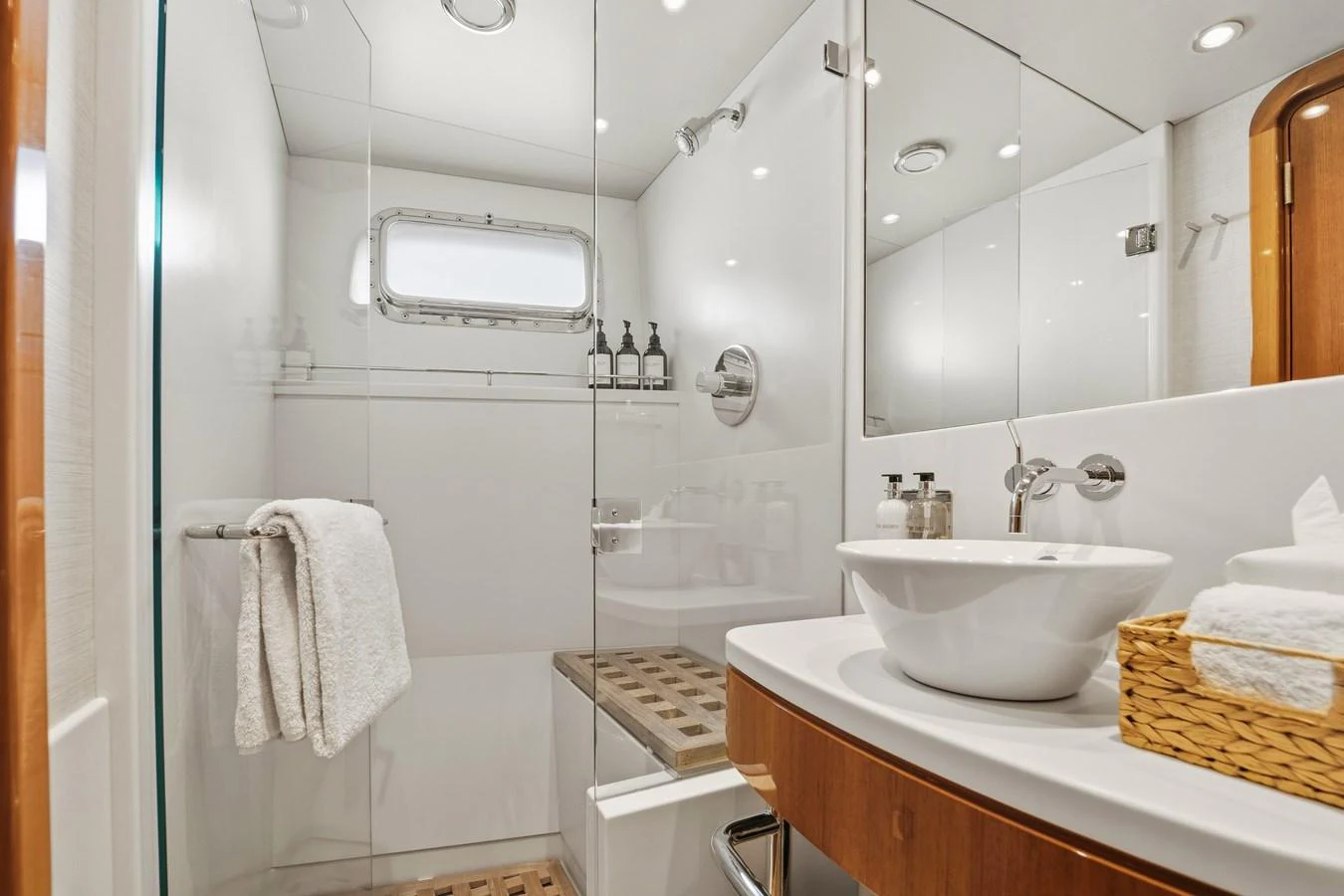 a bathroom with a sink and a shower aboard STAMPEDE Yacht for Sale