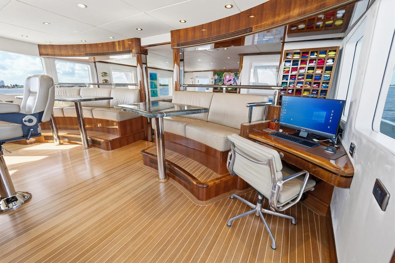 a room with a desk and a computer aboard STAMPEDE Yacht for Sale