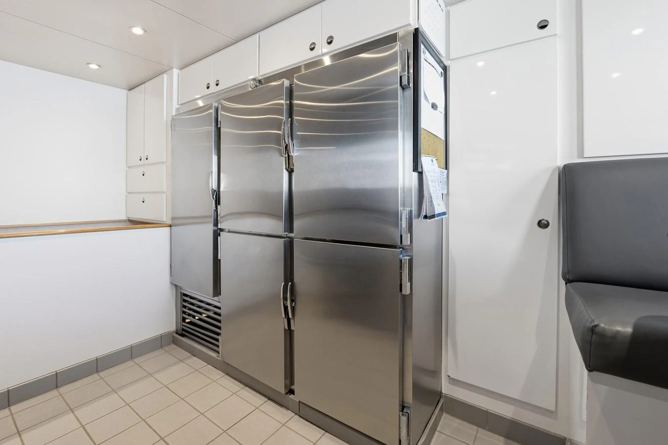 a large metal cabinet in a room aboard STAMPEDE Yacht for Sale