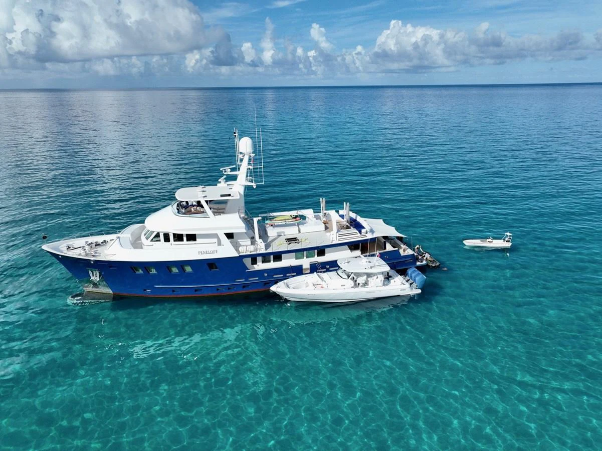 a boat in the water aboard STAMPEDE Yacht for Sale