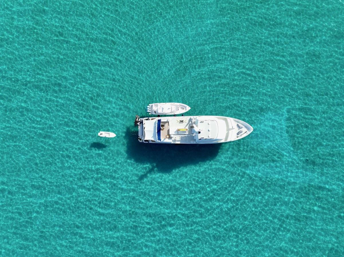 a boat in the water aboard STAMPEDE Yacht for Sale