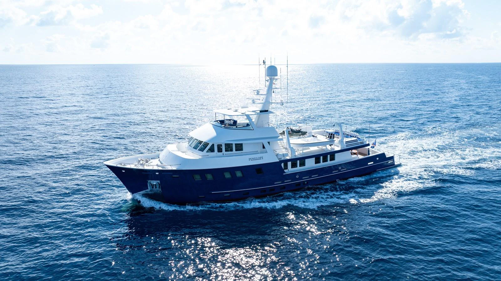 a boat in the water aboard STAMPEDE Yacht for Sale