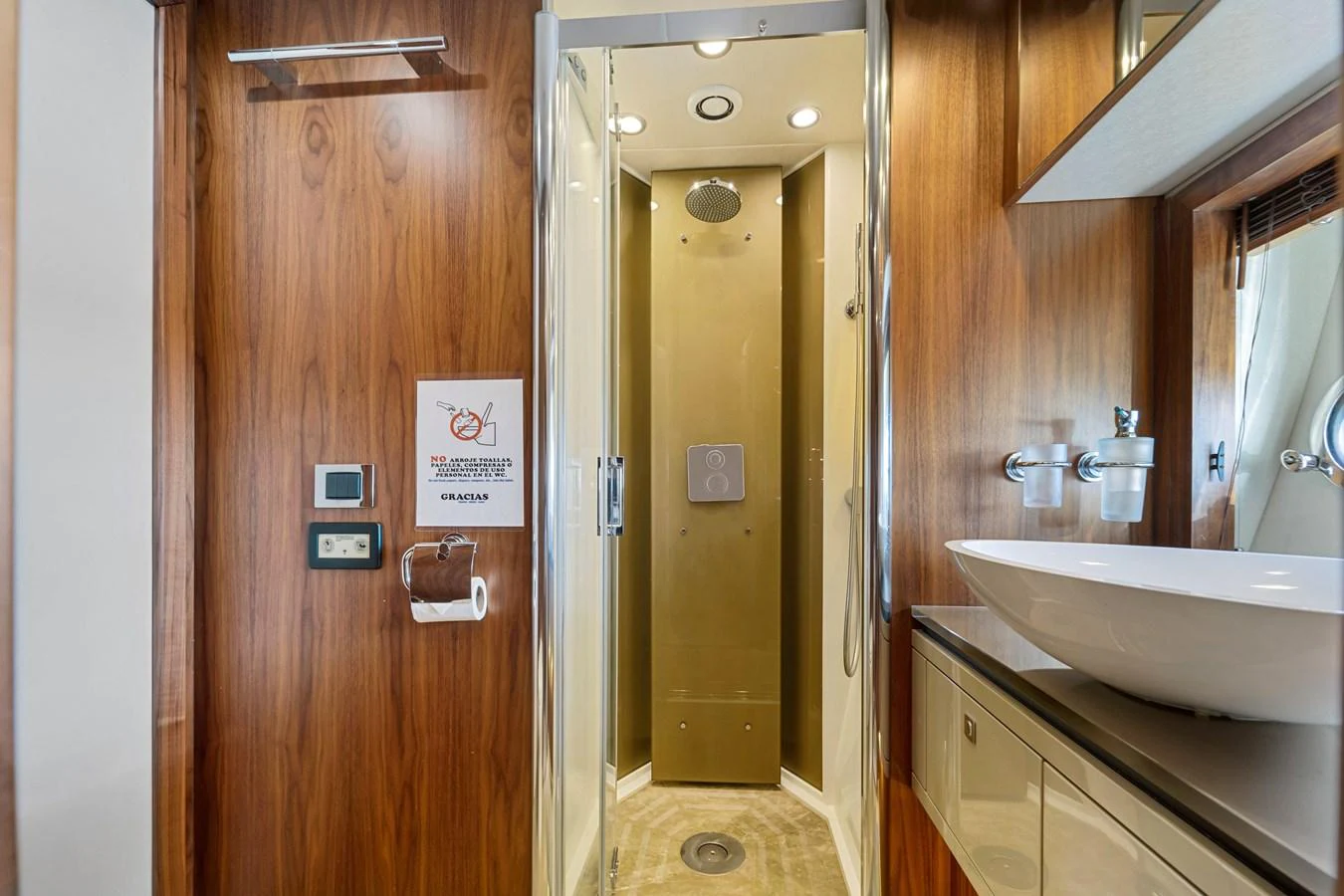 The yacht's bathroom features a modern shower and elegant fixtures. aboard GBXSK84PRD13 Yacht for Sale