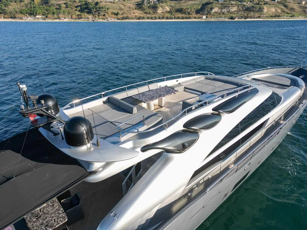 This sleek yacht features a spacious flybridge with ample seating and sunbathing areas, perfect for enjoying the open sea. aboard SPECTRE Yacht for Sale