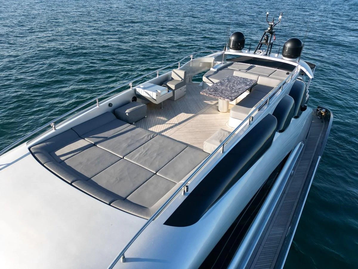 The yacht's sundeck offers a spacious and luxurious area for relaxation and socializing. aboard SPECTRE Yacht for Sale