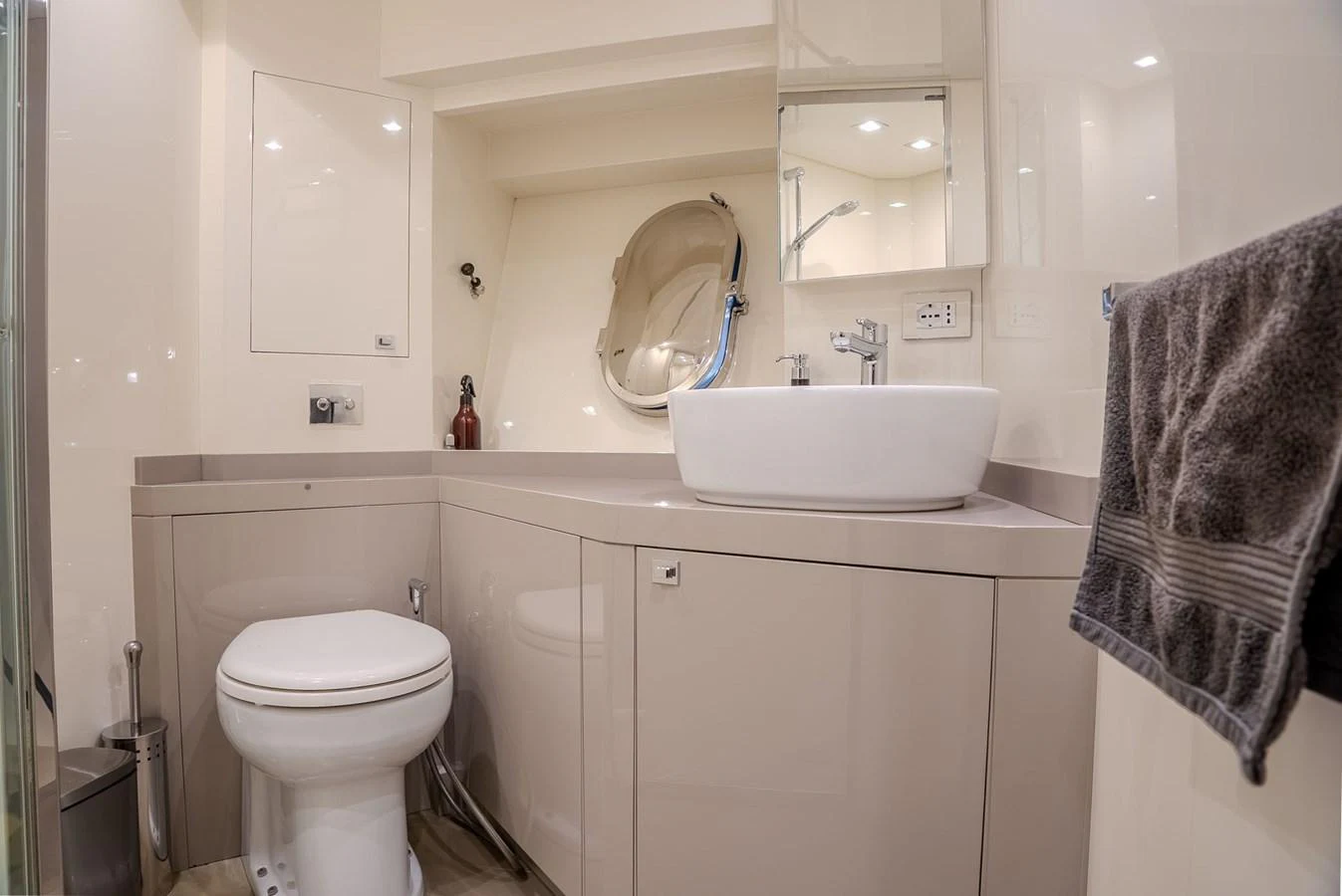 The yacht's bathroom features modern fixtures and a sleek design. aboard SPECTRE Yacht for Sale