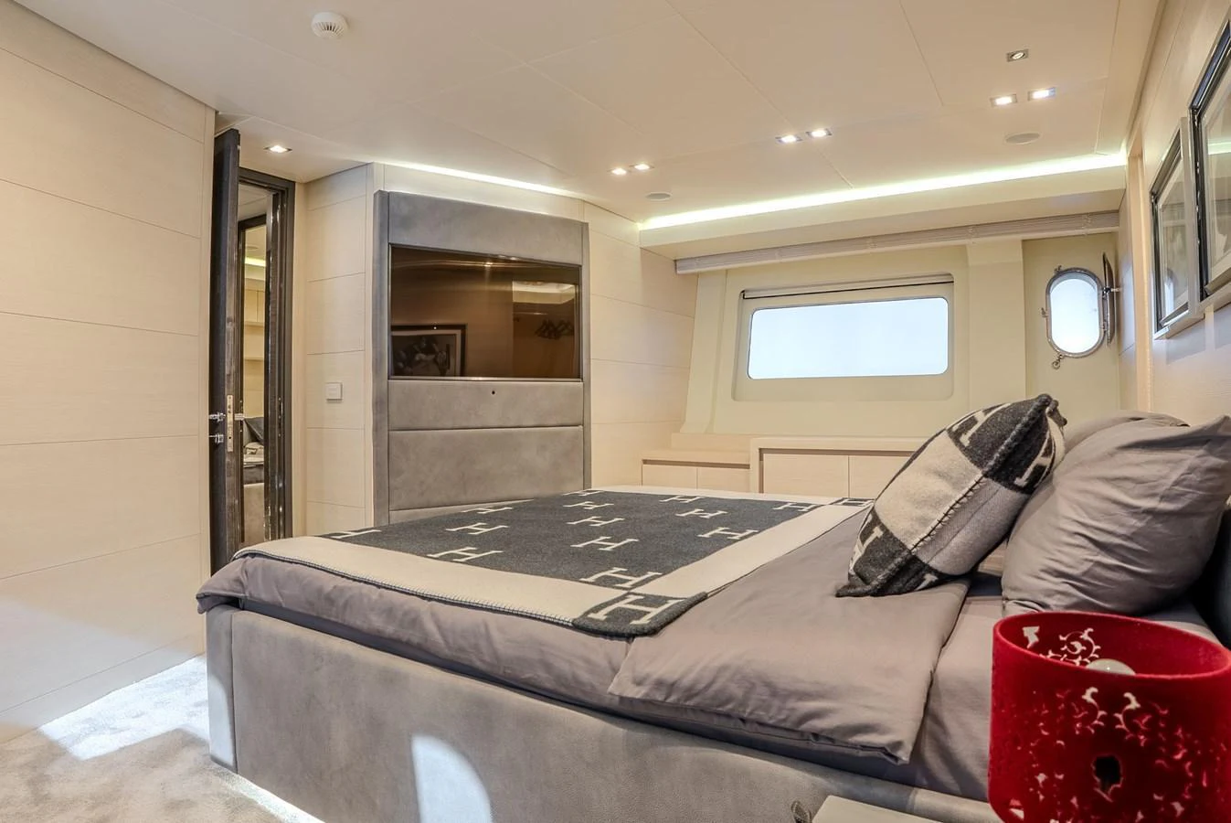 A luxurious stateroom featuring a comfortable bed and modern decor. aboard SPECTRE Yacht for Sale