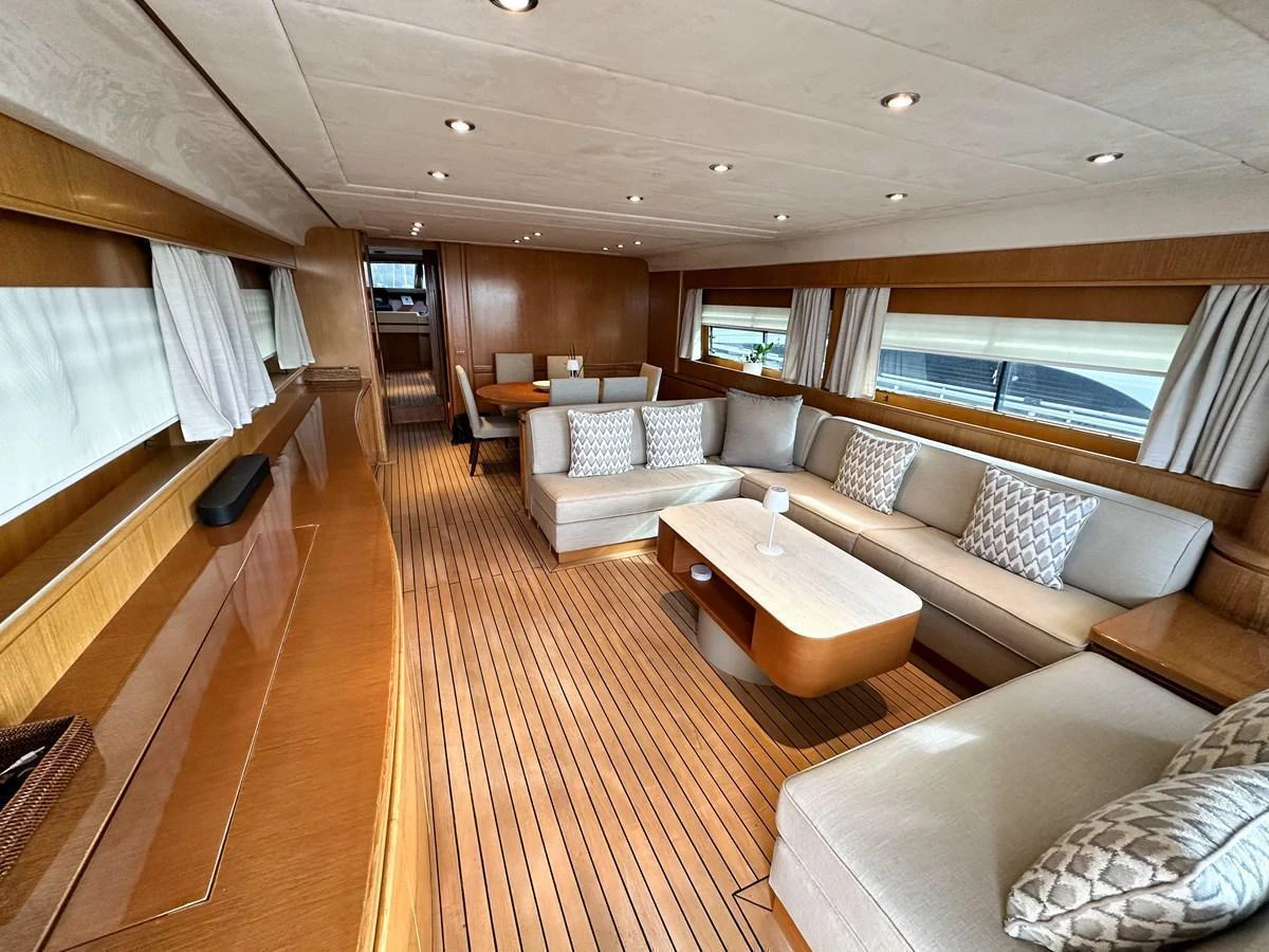 The salon features a spacious and elegant seating area with ample natural light. aboard GALINI Yacht for Sale
