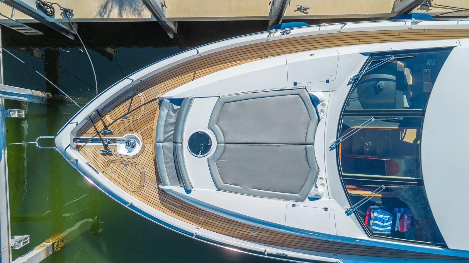 Aerial view of the yacht's bow showcasing sleek design and spacious sunbathing area. aboard BIG CHUBBY XL Yacht for Sale