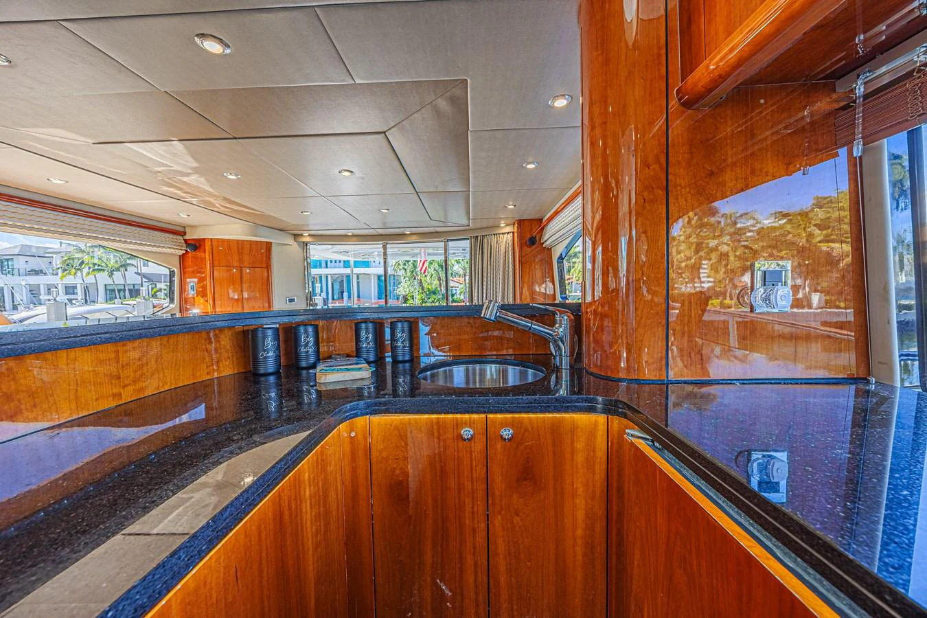 The yacht's galley features sleek countertops and polished wood finishes, offering a stylish and functional space for culinary activities. aboard BIG CHUBBY XL Yacht for Sale