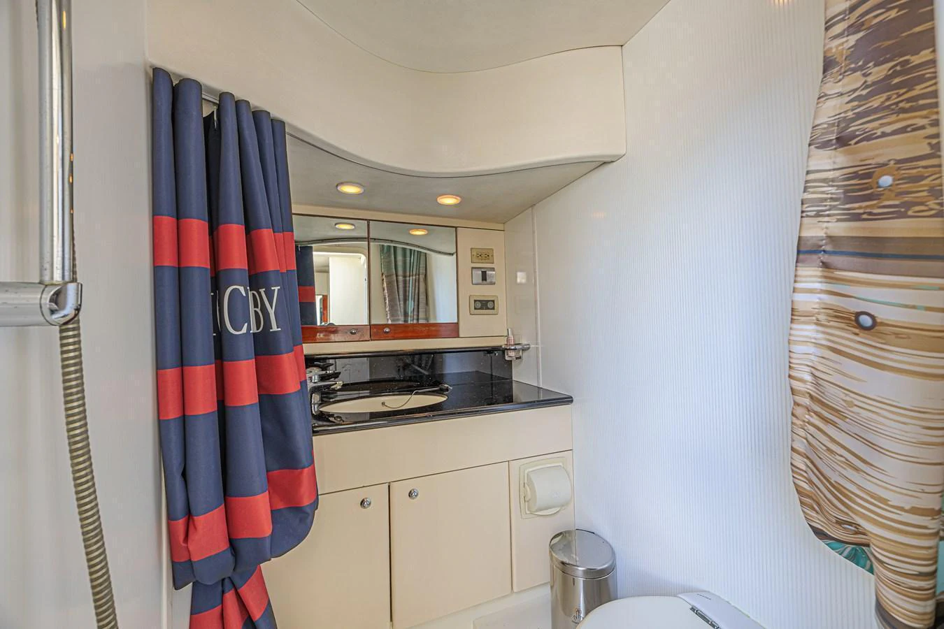 A well-appointed yacht bathroom with modern fixtures and stylish decor. aboard BIG CHUBBY XL Yacht for Sale