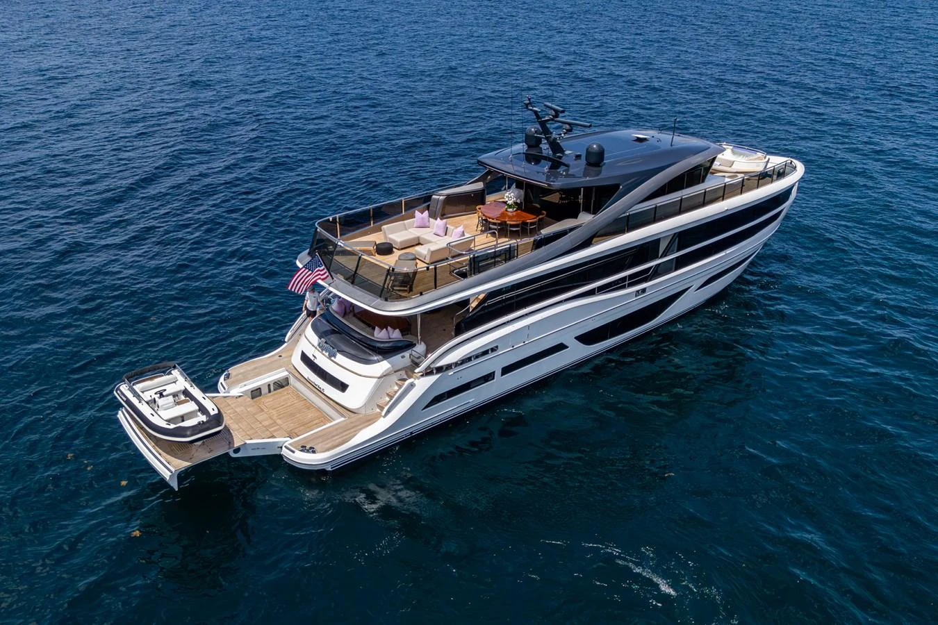 a large ship in the water aboard SPLASH Yacht for Sale
