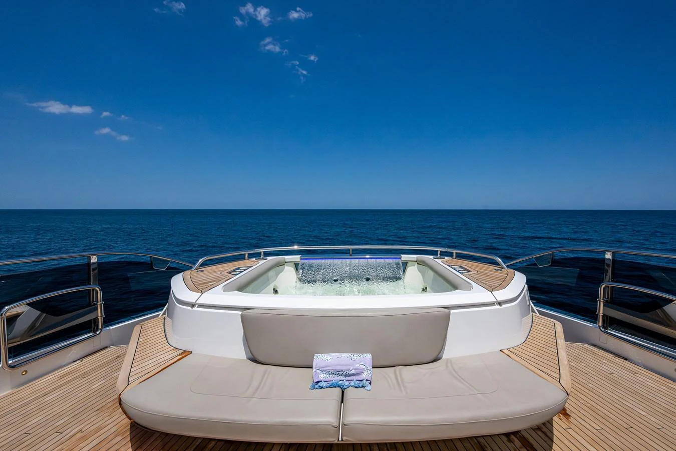 a boat on a deck aboard SPLASH Yacht for Sale