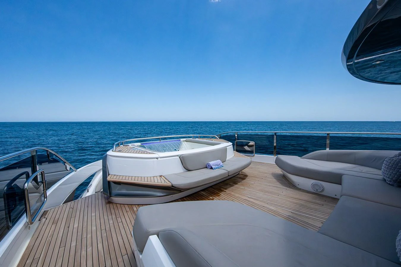 a boat on a deck aboard SPLASH Yacht for Sale