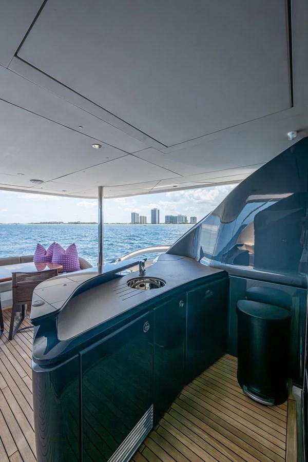 a boat on a deck aboard SPLASH Yacht for Sale