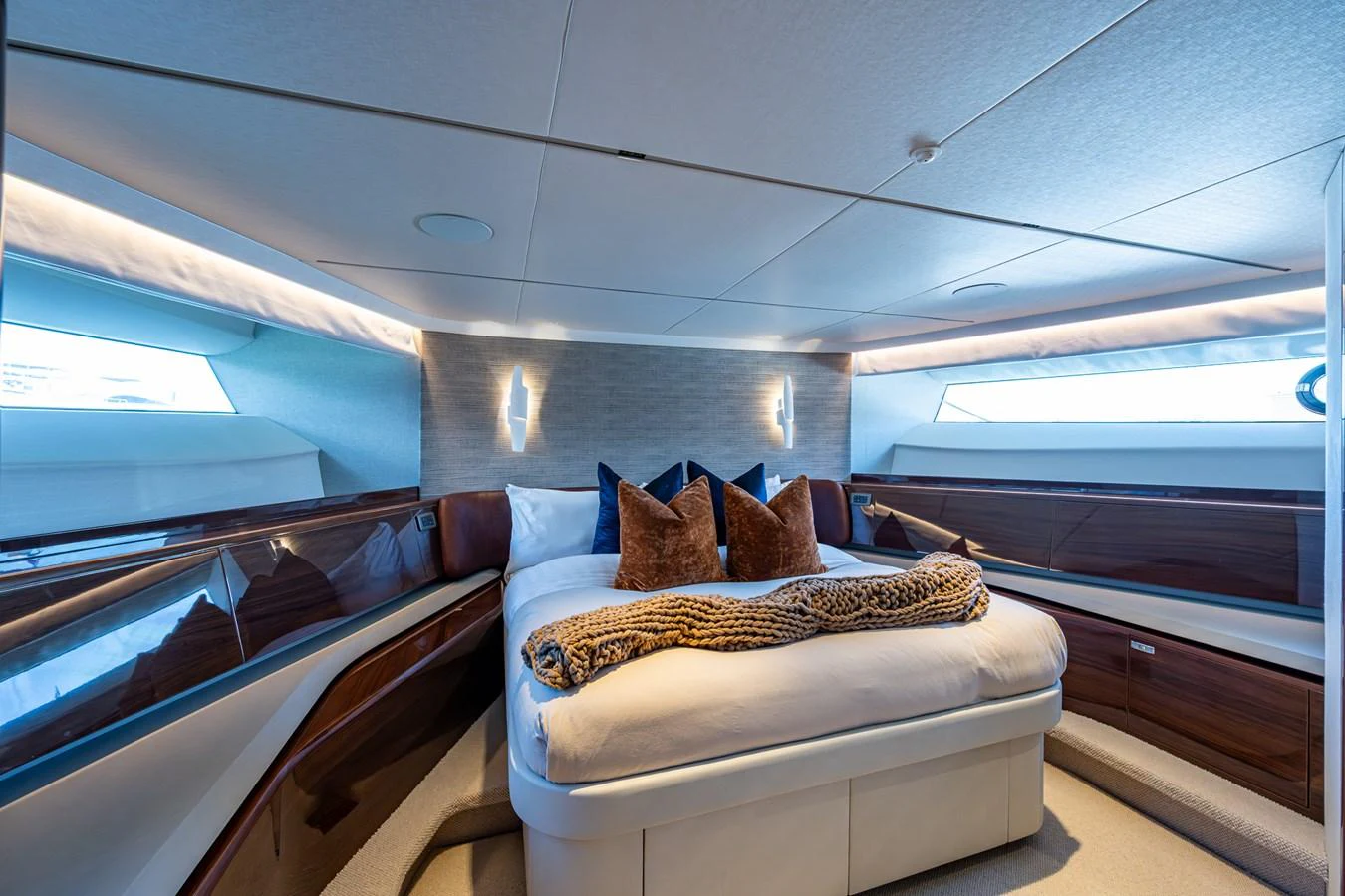a bed in a room aboard SPLASH Yacht for Sale