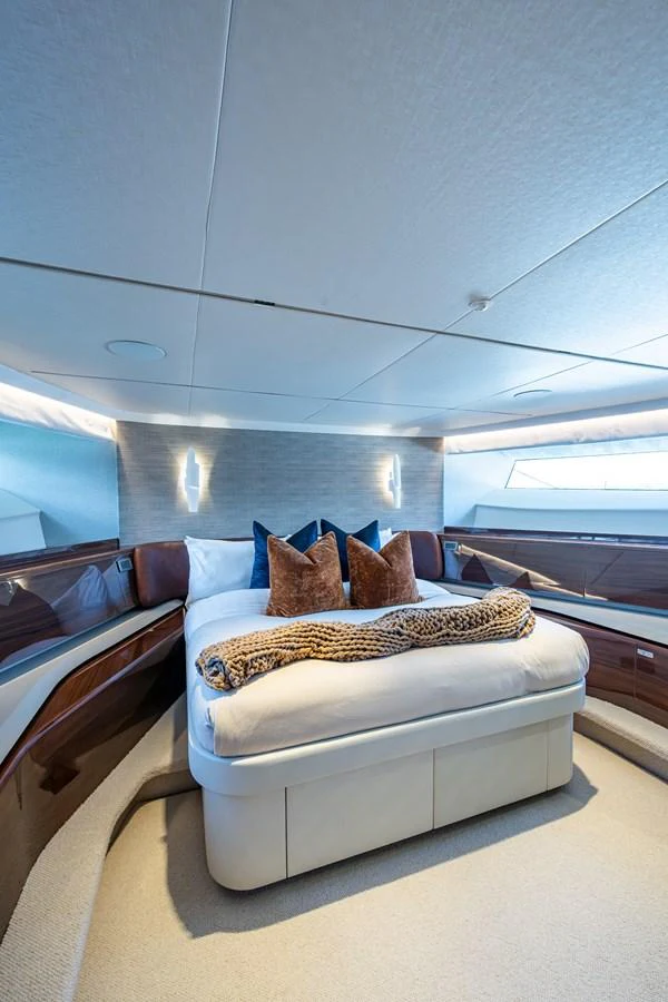 a bed in a room aboard SPLASH Yacht for Sale